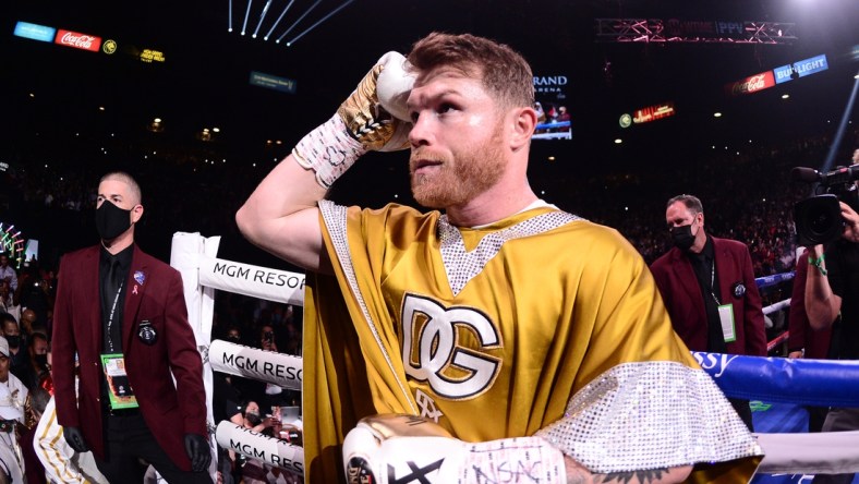 Nov 6, 2021; Las Vegas, Nevada, USA; Canelo Alvarez enters the ring to face Caleb Plant in their undisputed super middleweight world championship boxing match at MGM Grand Garden Arena. Mandatory Credit: Joe Camporeale-USA TODAY Sports