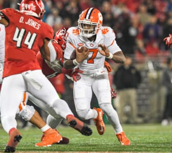 Clemson quarterback Taisun Phommachanh looks for yardage last week after he came in for injured starter D.J. Uiagalelei.Ncaa Football Clemson At Louisville