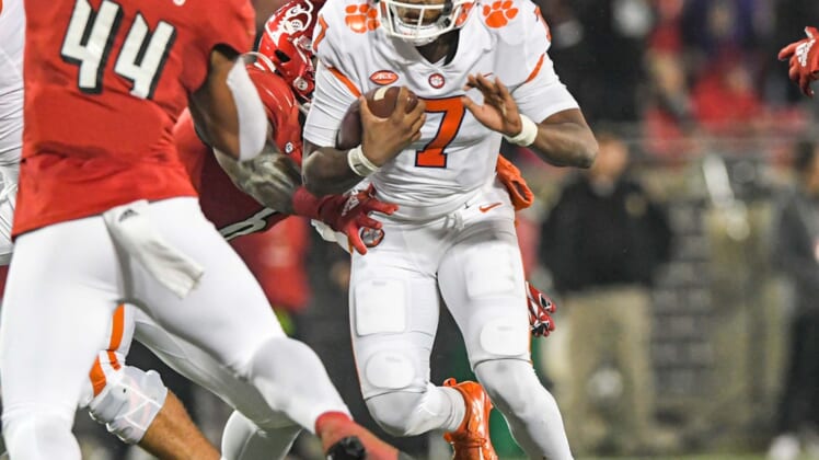 Clemson quarterback Taisun Phommachanh looks for yardage last week after he came in for injured starter D.J. Uiagalelei.Ncaa Football Clemson At Louisville