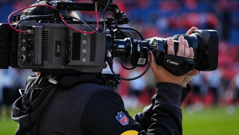 Nov 14, 2021; Denver, Colorado, USA; General view of a CBS sports sideline camera prior to the game between the against the Philadelphia Eagles against the Denver Broncos at Empower Field at Mile High. Mandatory Credit: Ron Chenoy-USA TODAY Sports