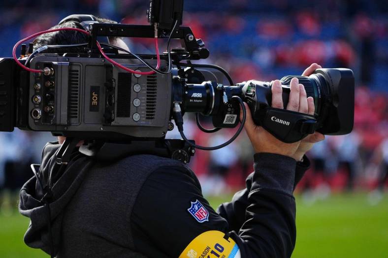 Nov 14, 2021; Denver, Colorado, USA; General view of a CBS sports sideline camera prior to the game between the against the Philadelphia Eagles against the Denver Broncos at Empower Field at Mile High. Mandatory Credit: Ron Chenoy-USA TODAY Sports
