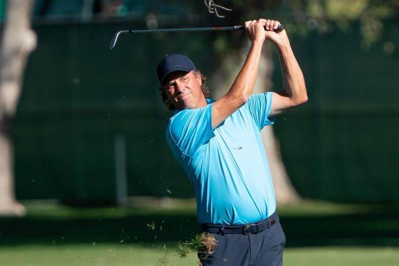 Nov 14, 2021; Phoenix, Arizona, USA; Stephen Ames watches his approach to the ninth during the final round of the Charles Schwab Cup Championship golf tournament at Phoenix Country Club. Mandatory Credit: Allan Henry-USA TODAY Sports