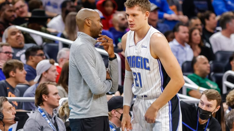 Nov 13, 2021; Orlando, Florida, USA; Orlando Magic head coach Jamahl Mosley talks to center Moritz Wagner (21) during the second quarter at Amway Center. Mandatory Credit: Mike Watters-USA TODAY Sports