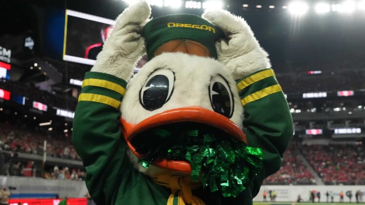 Dec 3, 2021; Las Vegas, NV, USA; Oregon Ducks mascot Puddles poses against the Utah Utes in the second half during the 2021 Pac-12 Championship Game at Allegiant Stadium.Utah defeated Oregon 38-10.  Mandatory Credit: Kirby Lee-USA TODAY Sports