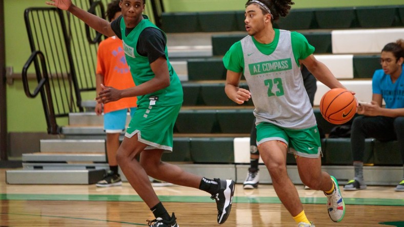 December 6, 2021; Chandler, AZ; AZ Compass Prep varsity basketball player, junior, Kylan Boswell, 23, and junior, Mookie Cook, 1, practice at the AZ Compass Prep gymnasium the week of the Hoophall West tournament

Az Compass Basketball