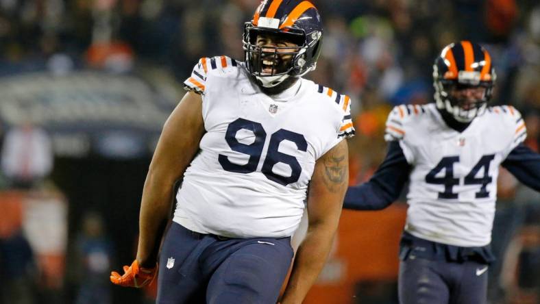 Dec 20, 2021; Chicago, Illinois, USA; Chicago Bears defensive end Akiem Hicks (96) reacts after sacking Minnesota Vikings quarterback Kirk Cousins (not pictured) during the second half at Soldier Field. The Minnesota Vikings won 17-9. Mandatory Credit: Jon Durr-USA TODAY Sports