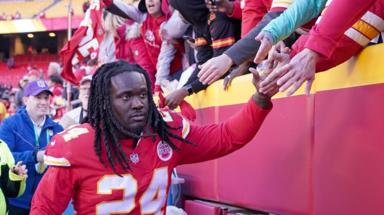 Dec 12, 2021; Kansas City, Missouri, USA; Kansas City Chiefs defensive end Melvin Ingram (24) greets fans while leaving the field after the win over the Las Vegas Raiders at GEHA Field at Arrowhead Stadium. Mandatory Credit: Denny Medley-USA TODAY Sports