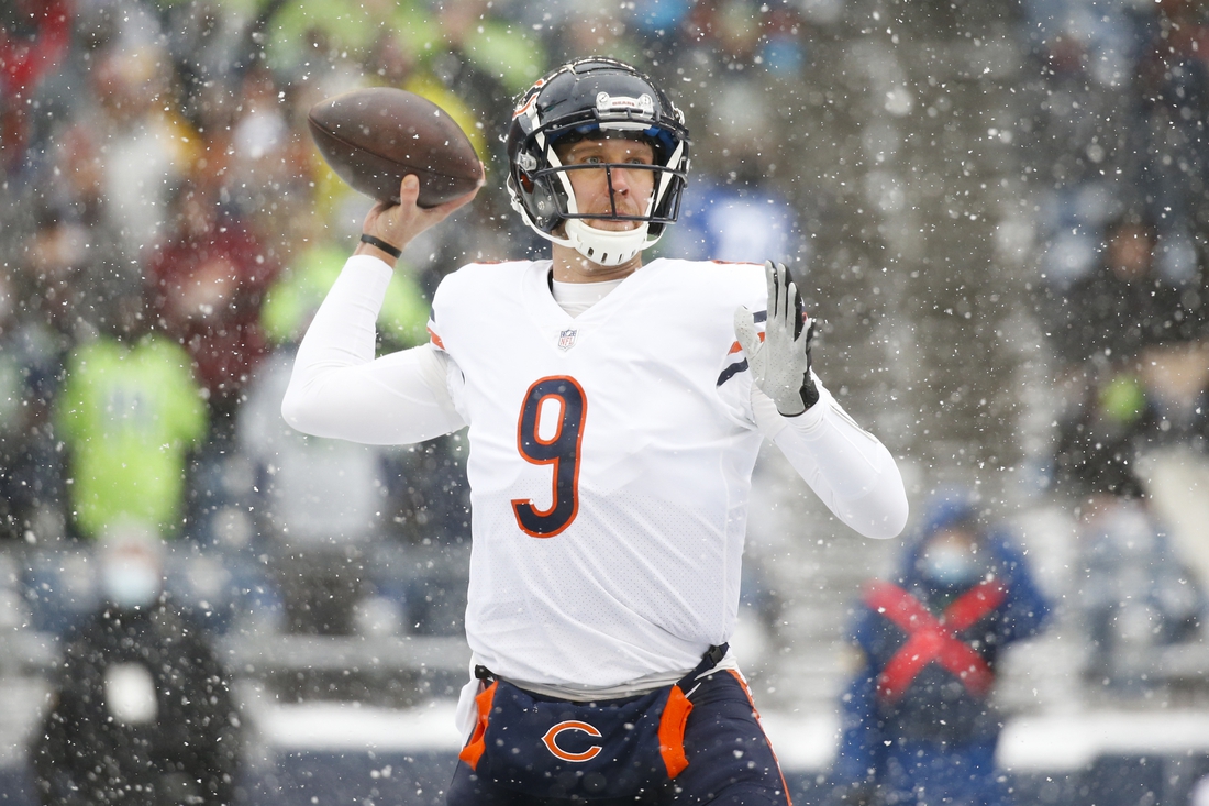 Dec 26, 2021; Seattle, Washington, USA; Chicago Bears quarterback Nick Foles (9) passes against the Seattle Seahawks during the first quarter at Lumen Field. Mandatory Credit: Joe Nicholson-USA TODAY Sports