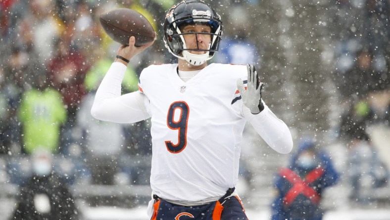 Dec 26, 2021; Seattle, Washington, USA; Chicago Bears quarterback Nick Foles (9) passes against the Seattle Seahawks during the first quarter at Lumen Field. Mandatory Credit: Joe Nicholson-USA TODAY Sports