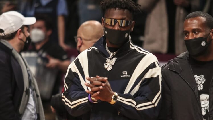 Jan 3, 2022; Brooklyn, New York, USA;  Former NFL wide receiver Antonio Brown watches the game between the Memphis Grizzlies and the Brooklyn Nets at Barclays Center. Mandatory Credit: Wendell Cruz-USA TODAY Sports