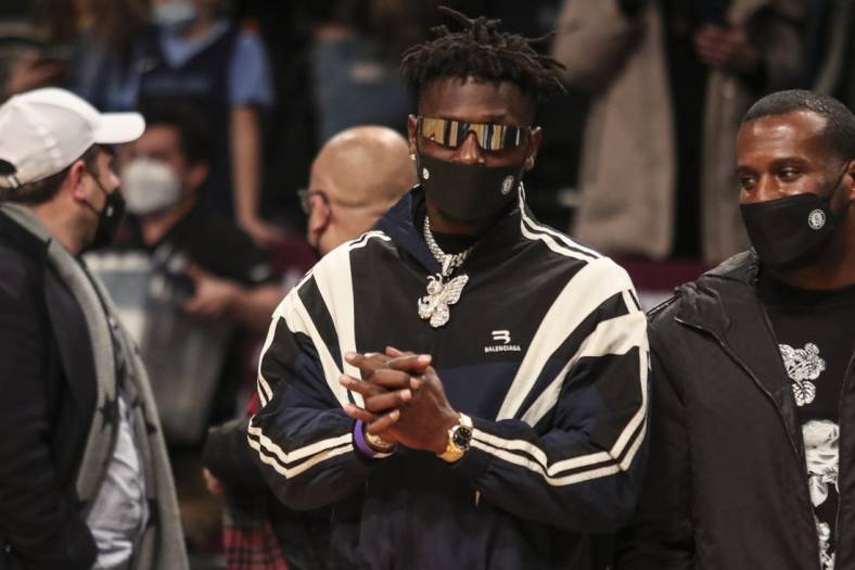 Jan 3, 2022; Brooklyn, New York, USA;  Former NFL wide receiver Antonio Brown watches the game between the Memphis Grizzlies and the Brooklyn Nets at Barclays Center. Mandatory Credit: Wendell Cruz-USA TODAY Sports