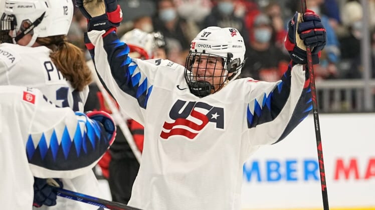 Nov 21, 2021; Kingston, Ontario, CAN; USA forward Abbey Murphy (37) celebrates a win over Canada in overtime of a Rivalry Series women's hockey game at Leon's Centre. Mandatory Credit: John E. Sokolowski-USA TODAY Sports