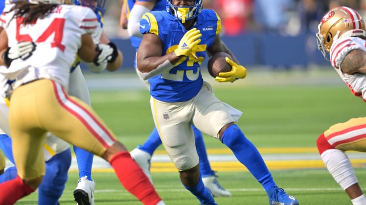 Jan 9, 2022; Inglewood, California, USA;   Los Angeles Rams running back Sony Michel (25) runs for a first down in the first half of the game against the San Francisco 49ers at SoFi Stadium. Mandatory Credit: Jayne Kamin-Oncea-USA TODAY Sports