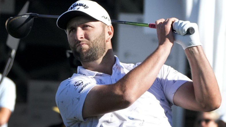 Feb 9, 2022; Scottsdale, AZ, USA;  Pro golfer Jon Rahm, watches his ball from the 10th tee box during the WM Phoenix Open Annexus Pro-Am at TPC Scottsdale.

Golf Wm Phoenix Open Day 3