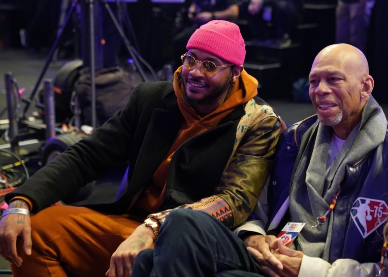 Feb 19, 2022; Cleveland, OH, USA; Carmelo Anthony (left) talks with Kareem Abdul-Jabbar during the Skills Challenge during the 2022 NBA All-Star Saturday Night at Rocket Mortgage Field House. Mandatory Credit: Kyle Terada-USA TODAY Sports