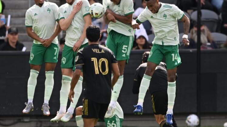 Feb 26, 2022; Los Angeles, California, USA; Los Angeles FC forward Carlos Vela (10) looks on as the Colorado Rapids defend against a free kick during the game at Banc of California Stadium. Mandatory Credit: Jayne Kamin-Oncea-USA TODAY Sports