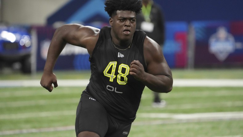 Mar 4, 2022; Indianapolis, IN, USA; Tulsa offensive lineman Tyler Smith (OL48) goes through drills during the 2022 NFL Scouting Combine at Lucas Oil Stadium. Mandatory Credit: Kirby Lee-USA TODAY Sports