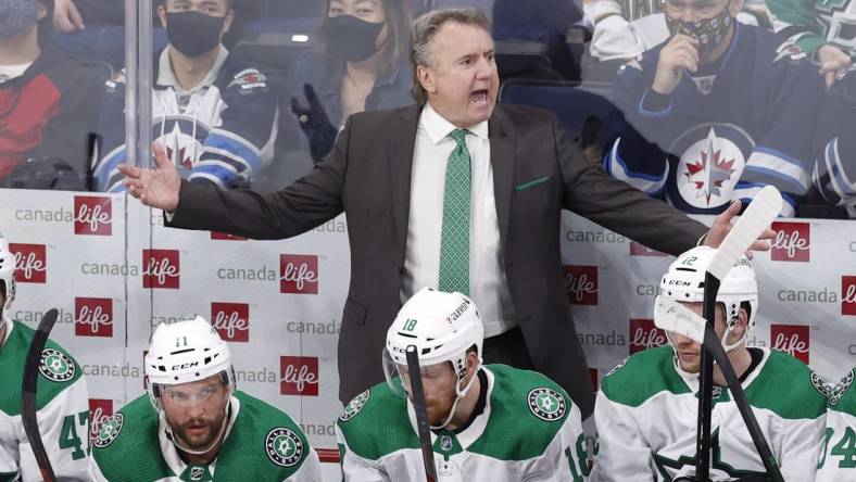 Mar 4, 2022; Winnipeg, Manitoba, CAN;  Dallas Stars Head Coach Rick Bowness gestures in the third period against the Winnipeg Jets at Canada Life Centre. Mandatory Credit: James Carey Lauder-USA TODAY Sports