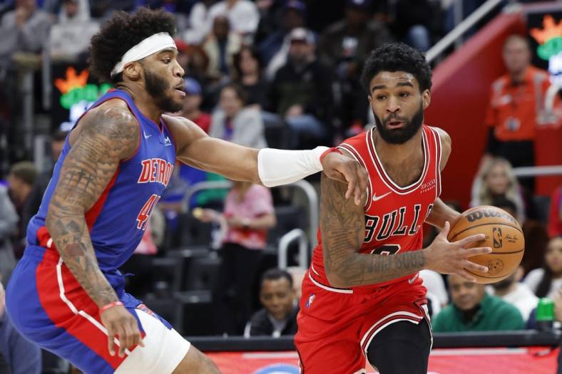 Mar 9, 2022; Detroit, Michigan, USA; Chicago Bulls guard Coby White (0) is defended by Detroit Pistons forward Saddiq Bey (41) in the second half at Little Caesars Arena. Mandatory Credit: Rick Osentoski-USA TODAY Sports