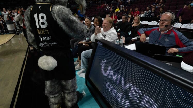 March 8, 2022; Las Vegas, NV, USA; Las Vegas Aces mascot Buckets and owner Mark Davis during the first half in the finals of the WCC Basketball Championships at Orleans Arena. Mandatory Credit: Kyle Terada-USA TODAY Sports