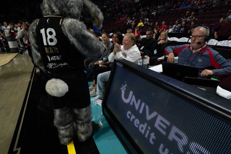 March 8, 2022; Las Vegas, NV, USA; Las Vegas Aces mascot Buckets and owner Mark Davis during the first half in the finals of the WCC Basketball Championships at Orleans Arena. Mandatory Credit: Kyle Terada-USA TODAY Sports