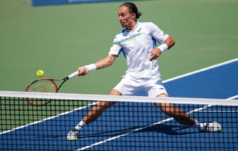 Alexandr Dolgopolov, of Ukraine, approaches the net in the second set to return a shot to Novak Djokovic, of Serbia, their semifinal match, Saturday, Aug. 22, 2015, at the Lindner Family Tennis Center in Mason, Ohio.Xxx 082215 Tennis 06 Jpg S Ten Usa Oh