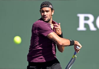 Mar 16, 2022; Indian Wells, CA, USA; Matteo Berrettini (ITA) hits a shot during his fourth round match against Miomir Kecmanovic (not pictured) at the BNP Paribas Open at the Indian Wells Tennis Garden. Mandatory Credit: Jayne Kamin-Oncea-USA TODAY Sports
