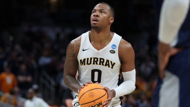 Mar 19, 2022; Indianapolis, IN, USA; Murray State Racers forward KJ Williams (0) shoots the ball in the second half against the St. Peter's Peacocks during the second round of the 2022 NCAA Tournament at Gainbridge Fieldhouse. Mandatory Credit: Trevor Ruszkowski-USA TODAY Sports