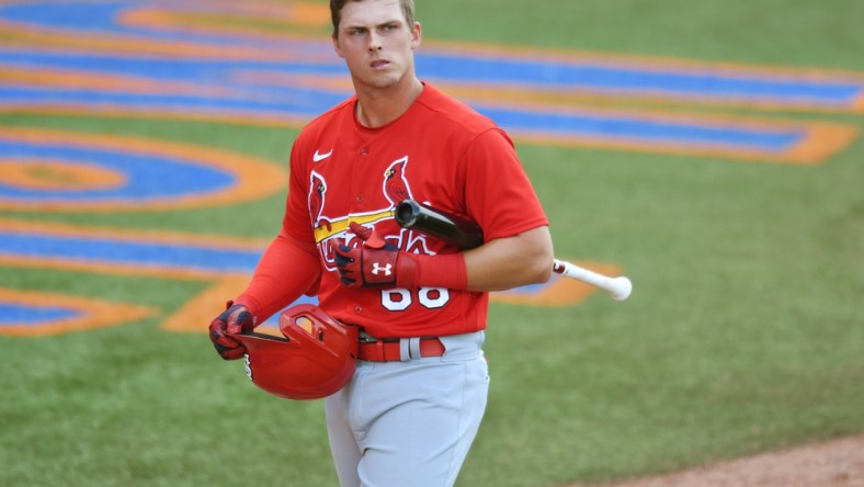 Mar 20, 2022; Port St. Lucie, Florida, USA; Nolan Gorman (68) walks back to the dugout after striking out in the eighth inning during a spring training game against the New York Mets at Clover Park. Mandatory Credit: Jim Rassol-USA TODAY Sports