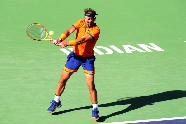 Rafael Nadal of Spain hits a return to American Taylor Fritz to during the men's final at the BNP Paribas Open in Indian Wells, Calif., on Sunday, March 2022.

Bnp Paribas Open Taylor Fritz Vs Rafael Nadal560