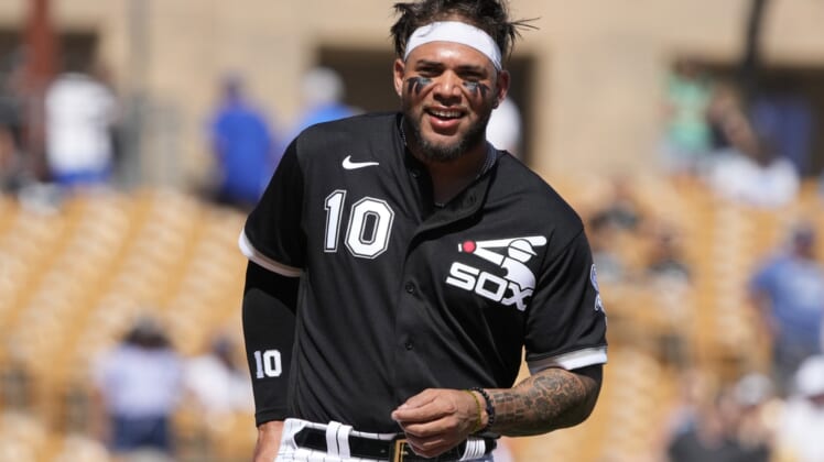 Mar 21, 2022; Phoenix, Arizona, USA; Chicago White Sox third baseman Yoan Moncada (10) gets ready to field against the Los Angeles Dodgers in the third inning during a spring training game at Camelback Ranch-Glendale. Mandatory Credit: Rick Scuteri-USA TODAY Sports