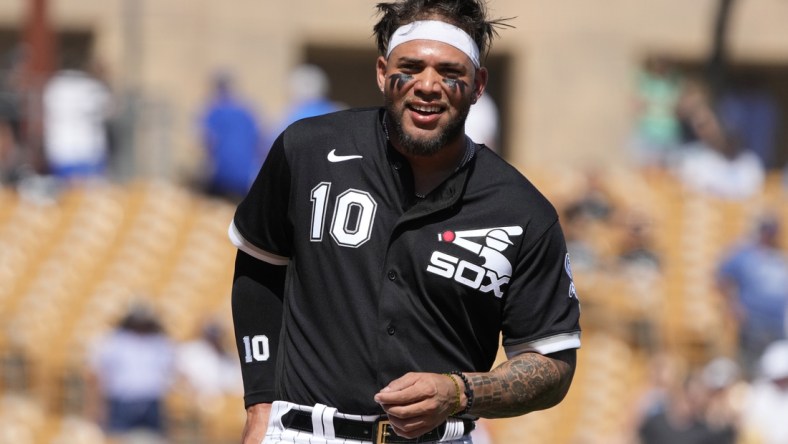 Mar 21, 2022; Phoenix, Arizona, USA; Chicago White Sox third baseman Yoan Moncada (10) gets ready to field against the Los Angeles Dodgers in the third inning during a spring training game at Camelback Ranch-Glendale. Mandatory Credit: Rick Scuteri-USA TODAY Sports