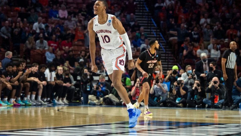 Auburn Tigers forward Jabari Smith (10) celebrates after making a three point basket during the first round of the 2022 NCAA tournament at Bon Secours Wellness Arena in Greenville, S.C., on Friday, March 18, 2022. Auburn Tigers lead Jacksonville State Gamecocks 39-27 at halftime.