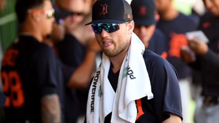 Mar 22, 2022; Clearwater, Florida, USA; Detroit Tigers infielder Kody Clemens (21) talks with his teammates before the start of the game against the Philadelphia Phillies during spring training at BayCare Ballpark. Mandatory Credit: Jonathan Dyer-USA TODAY Sports