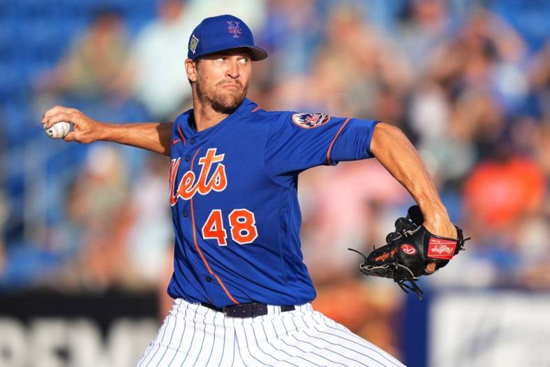Mar 22, 2022; Port St. Lucie, Florida, USA; New York Mets starting pitcher Jacob deGrom (48) delivers a pitch in the first inning of the spring training game against the Houston Astros at Clover Park. Mandatory Credit: Jasen Vinlove-USA TODAY Sports