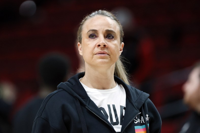 Mar 23, 2022; Portland, Oregon, USA; San Antonio Spurs assistant coach Becky Hammon watches the warm-up before a game against the Portland Trail Blazers at Moda Center. Mandatory Credit: Soobum Im-USA TODAY Sports
