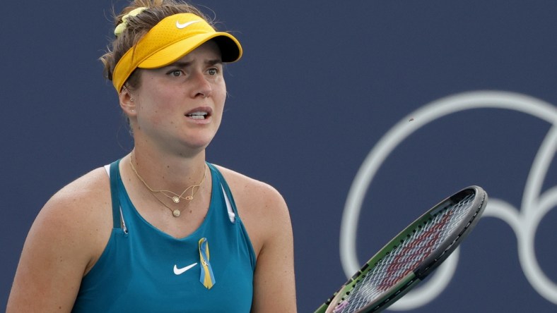 Mar 24, 2022; Miami Gardens, FL, USA; Elina Svitolina (UKR) prepares to receive serve against Heather Watson (GBR) (not pictured) in a second round women's singles match in the Miami Open at Hard Rock Stadium. Mandatory Credit: Geoff Burke-USA TODAY Sports