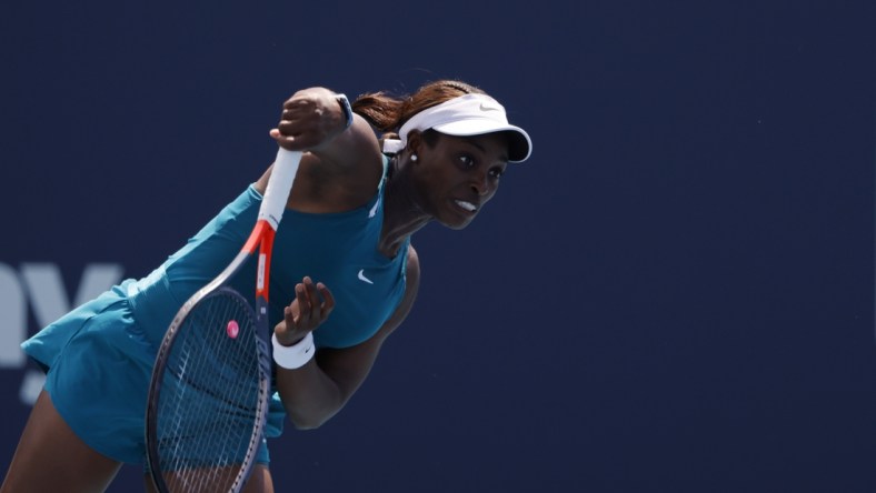 Mar 25, 2022; Miami Gardens, FL, USA; Sloane Stephens (USA) serves against Jessica Pegula (USA) (not pictured) in a second round women's match in the Miami Open at Hard Rock Stadium. Mandatory Credit: Geoff Burke-USA TODAY Sports