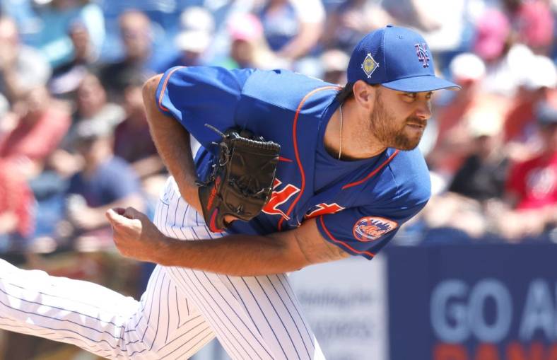 Mar 26, 2022; Port St. Lucie, Florida, USA;  New York Mets starting pitcher David Peterson (23) throws a pitch during the third inning against the Washington Nationals at Clover Park. Mandatory Credit: Reinhold Matay-USA TODAY Sports