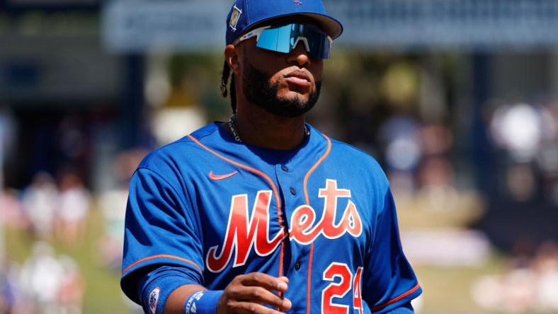 Mar 26, 2022; Port St. Lucie, Florida, USA;  New York Mets second baseman Robinson Cano (24) comes into the dugout during the fourth inning against the Washington Nationals at Clover Park. Mandatory Credit: Reinhold Matay-USA TODAY Sports