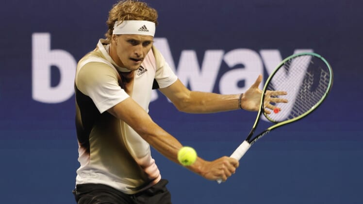Mar 30, 2022; Miami Gardens, FL, USA; Alexander Zverev (GER) hits a backhand against Casper Ruud (NOR)(not pictured) in a men's singles quarterfinal match in the Miami Open at Hard Rock Stadium. Mandatory Credit: Geoff Burke-USA TODAY Sports