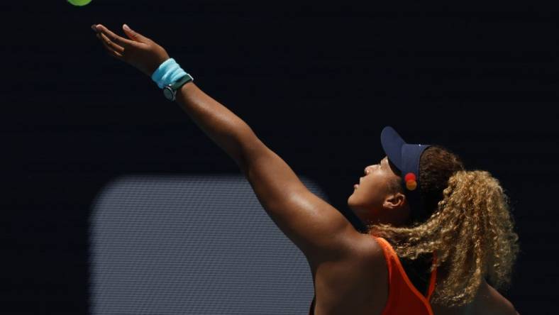 Apr 2, 2022; Miami Gardens, FL, USA; Naomi Osaka (JPN) hits a backhand against Iga Swiatek (POL)(not pictured) in the women's singles final in the Miami Open at Hard Rock Stadium. Mandatory Credit: Geoff Burke-USA TODAY Sports