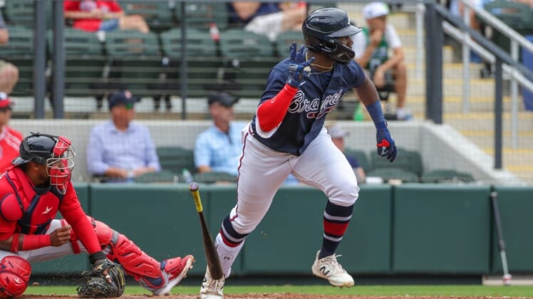 Apr 3, 2022; North Port, Florida, USA; Atlanta Braves outfielder Michael Harris II (76) hits a two-RBI single during the eighth inning against the Boston Red Sox during spring training at CoolToday Park. Mandatory Credit: Mike Watters-USA TODAY Sports