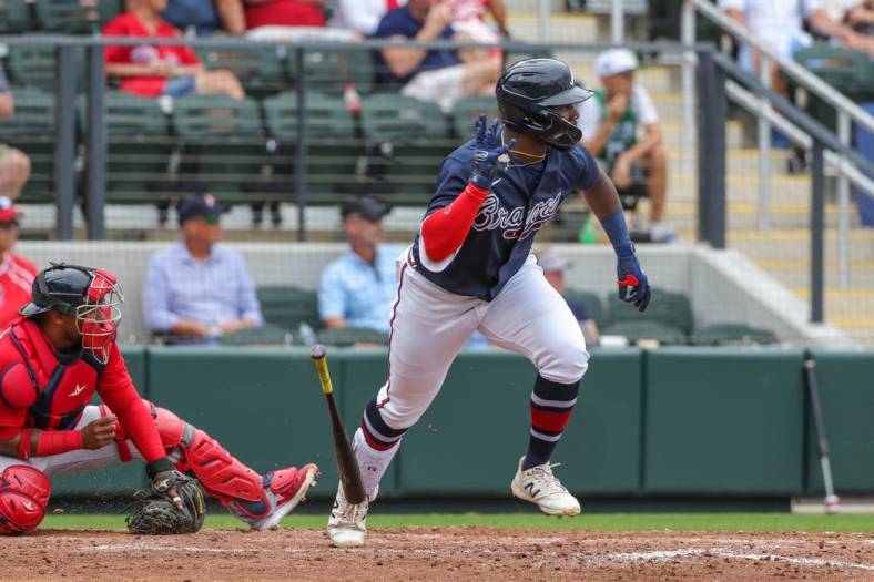 Apr 3, 2022; North Port, Florida, USA; Atlanta Braves outfielder Michael Harris II (76) hits a two-RBI single during the eighth inning against the Boston Red Sox during spring training at CoolToday Park. Mandatory Credit: Mike Watters-USA TODAY Sports