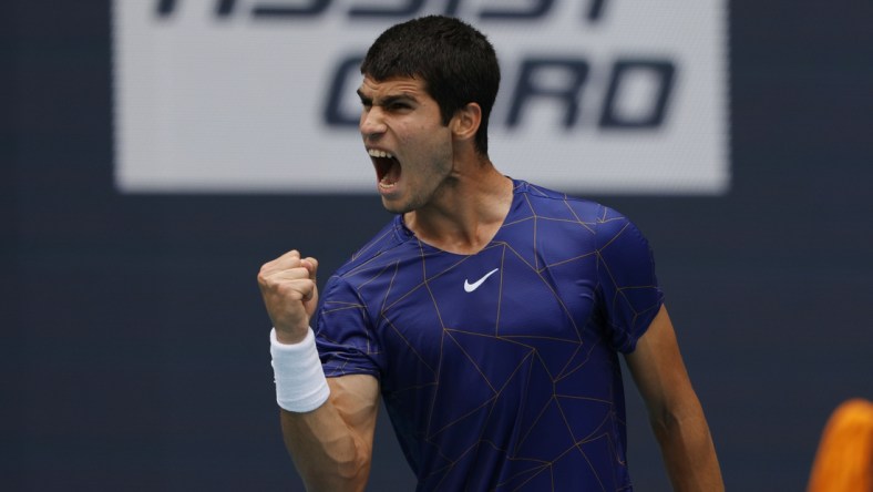 Apr 3, 2022; Miami Gardens, FL, USA; Carlos Alcaraz (ESP) reacts after winning a point against Casper Ruud (NOR)(not pictured) in the men's singles final in the Miami Open at Hard Rock Stadium. Mandatory Credit: Geoff Burke-USA TODAY Sports