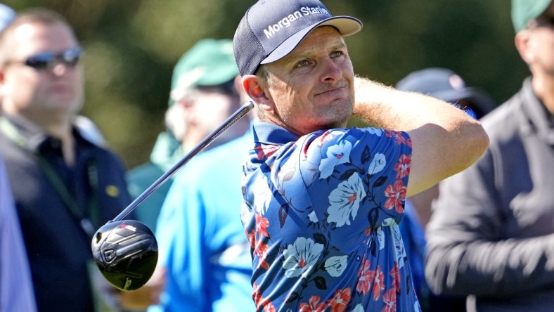 Apr 8, 2022; Augusta, Georgia, USA; Justin Rose plays his shot from the eighth tee during the second round of The Masters golf tournament. Mandatory Credit: Michael Madrid-USA TODAY Sports