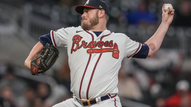 Apr 8, 2022; Cumberland, Georgia, USA; Atlanta Braves relief pitcher Tyler Matzek (68) pitches against the Cincinnati Reds during the eighth inning at Truist Park. Mandatory Credit: Dale Zanine-USA TODAY Sports