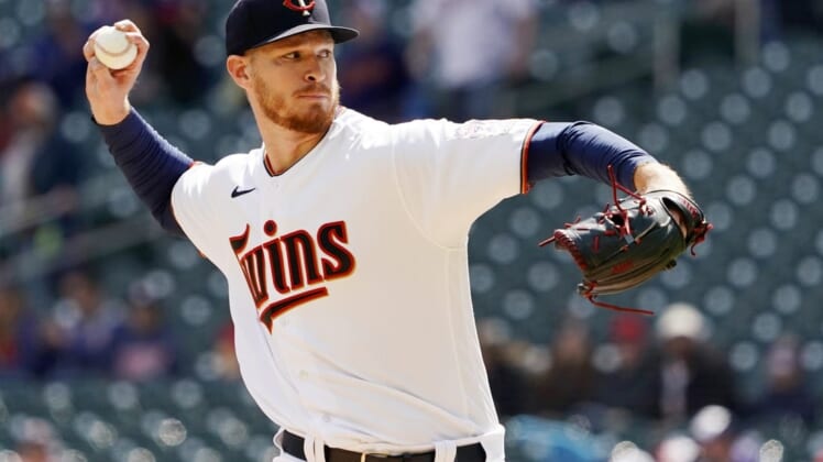 Apr 10, 2022; Minneapolis, Minnesota, USA; Minnesota Twins starting pitcher Bailey Ober (16) delivers a pitch against the Seattle Mariners during the first inning at Target Field. Mandatory Credit: Nick Wosika-USA TODAY Sports
