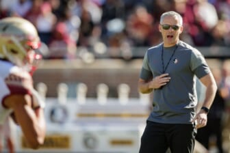 Florida State Seminoles head coach Mike Norvell conducts warm-ups in Doak Campbell Stadium before the Garnet and Gold spring game kickoff Saturday, April 9, 2022.Fsu Spring Game155