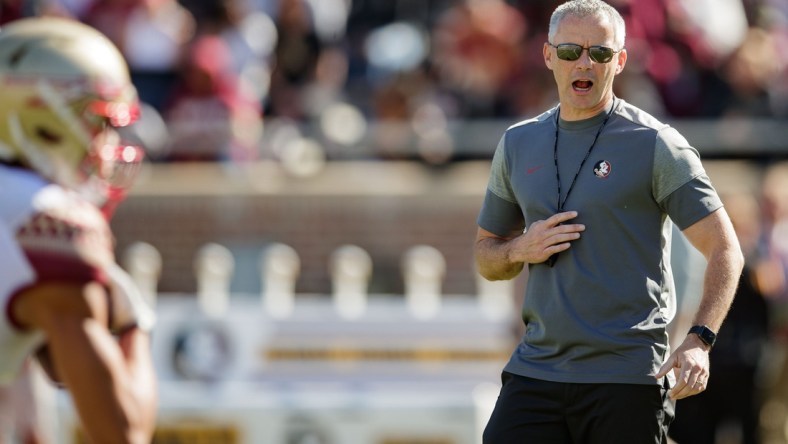 Florida State Seminoles head coach Mike Norvell conducts warm-ups in Doak Campbell Stadium before the Garnet and Gold spring game kickoff Saturday, April 9, 2022.

Fsu Spring Game155